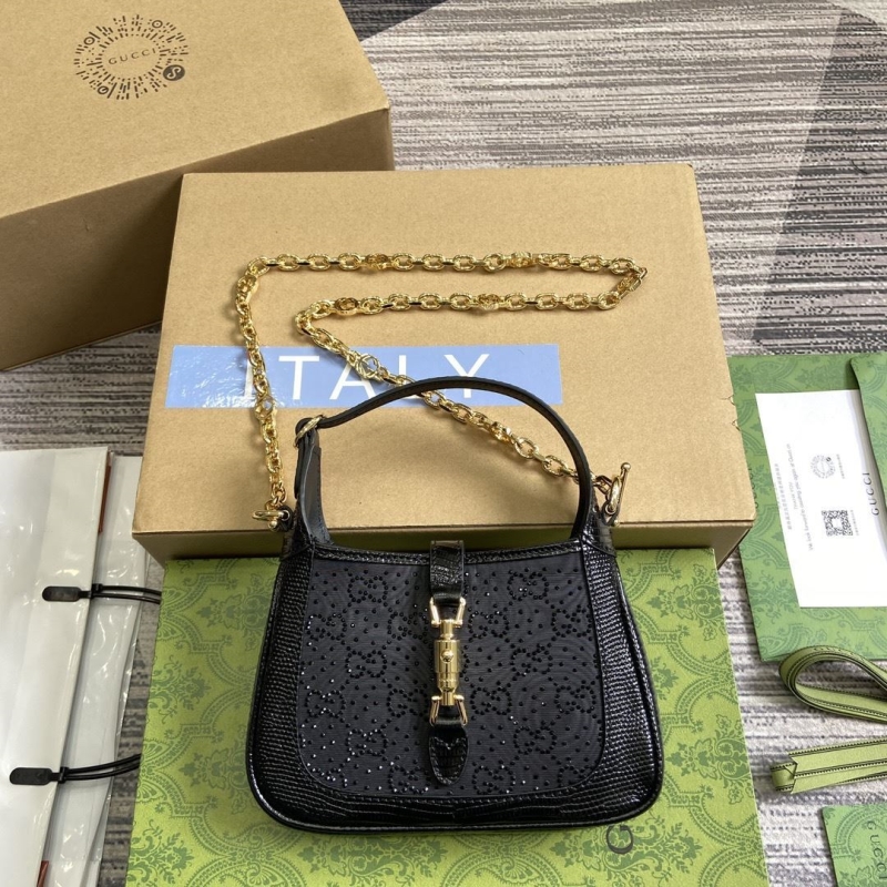 G*u*i top handle bags